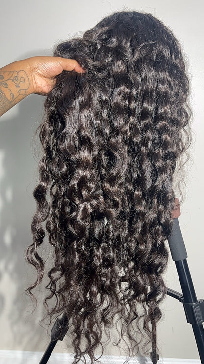 Raw SEA Curly hair showing its natural curl pattern, shine and density