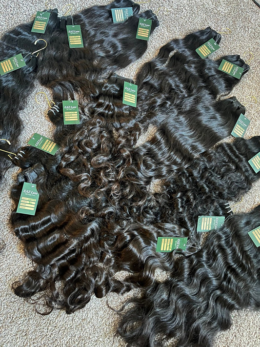 Raw SEA Straight, Wavy and Curly bundles displayed together for The Raw SEA Lookbook by EAZ Luxe